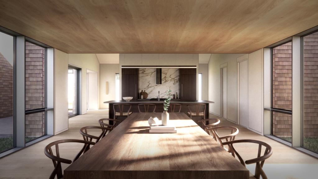 Dining room and kitchen seen through the glazed end of the main building