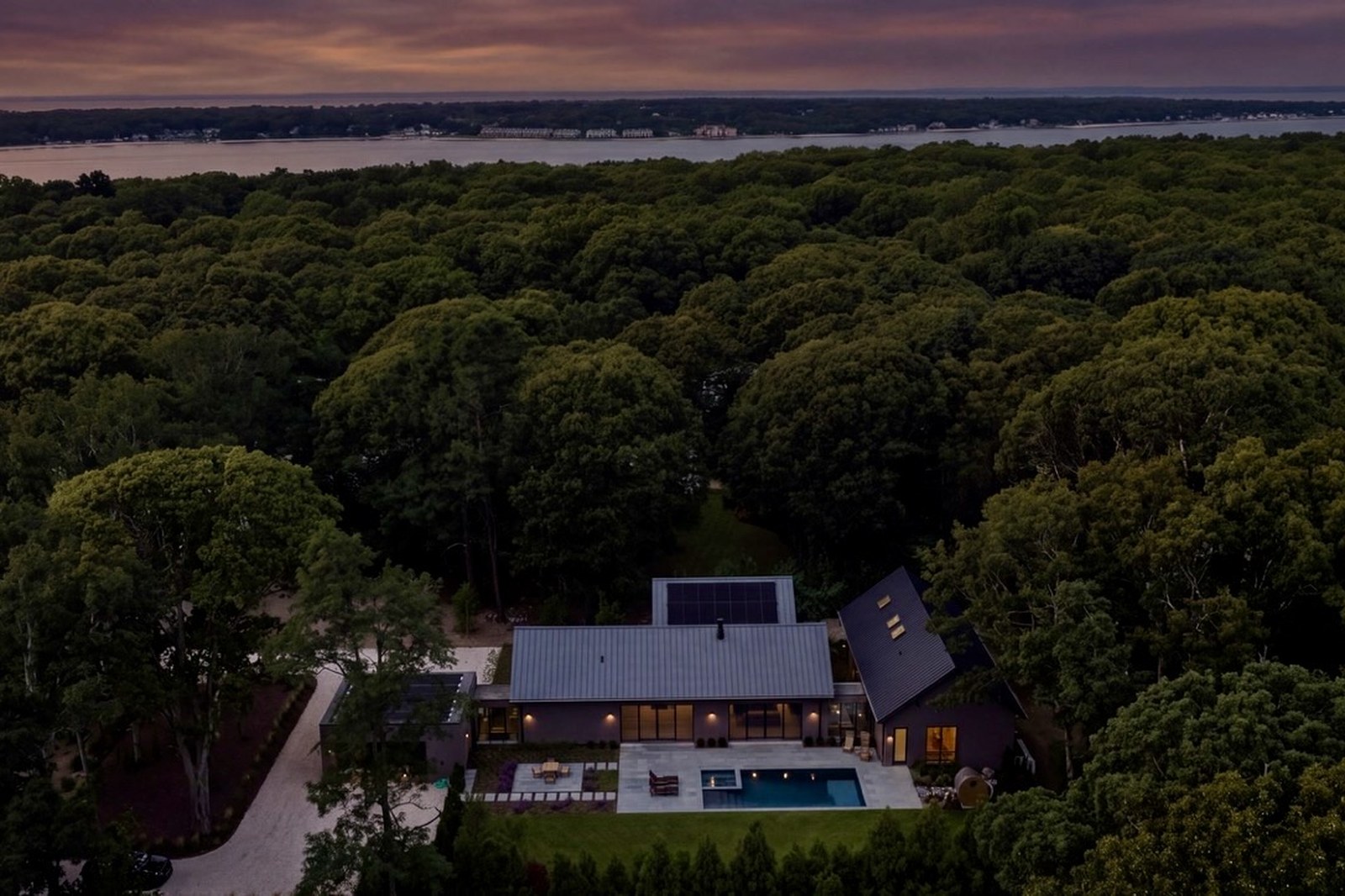 6 Great Circle from the air, the bay beyond the tree line